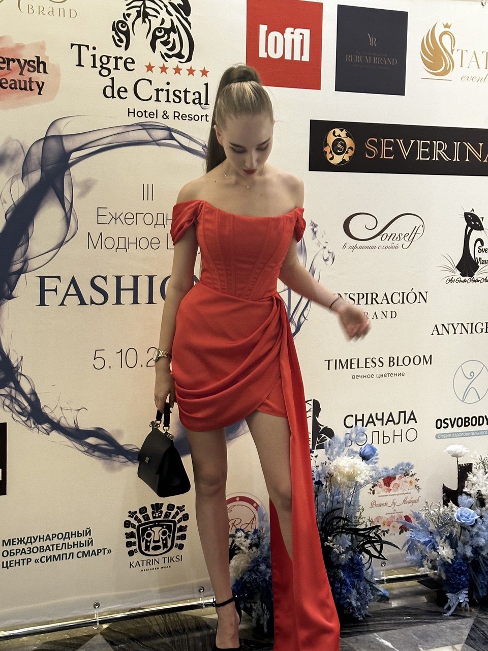 Red Mini Dress Made Of Dense Satin With A Gathered Skirt And Waist Train, Lace-Up Off-The-Shoulder Top