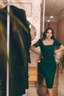 Emerald Dress With A Belt Made Of Feathers