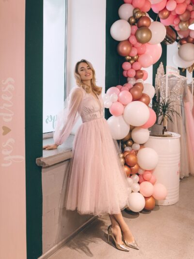 Dress With Sparkling Tulle, Long Sleeves And A Deep Neckline