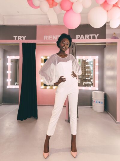 White jumpsuit with full tulle sleeves