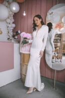 Stylish Dress White With Sleeves T A Deep Neckline On Bust