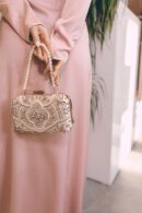 Clutch With A Pearl Handle