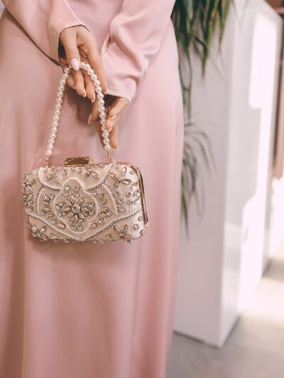 Clutch With A Pearl Handle